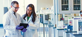 Two scientists in the lab