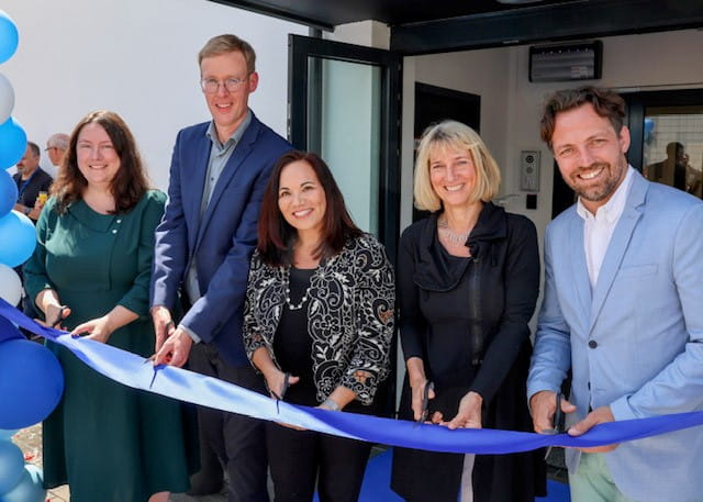 Ribbon-cutting at West’s Stolberg lab with key officials.