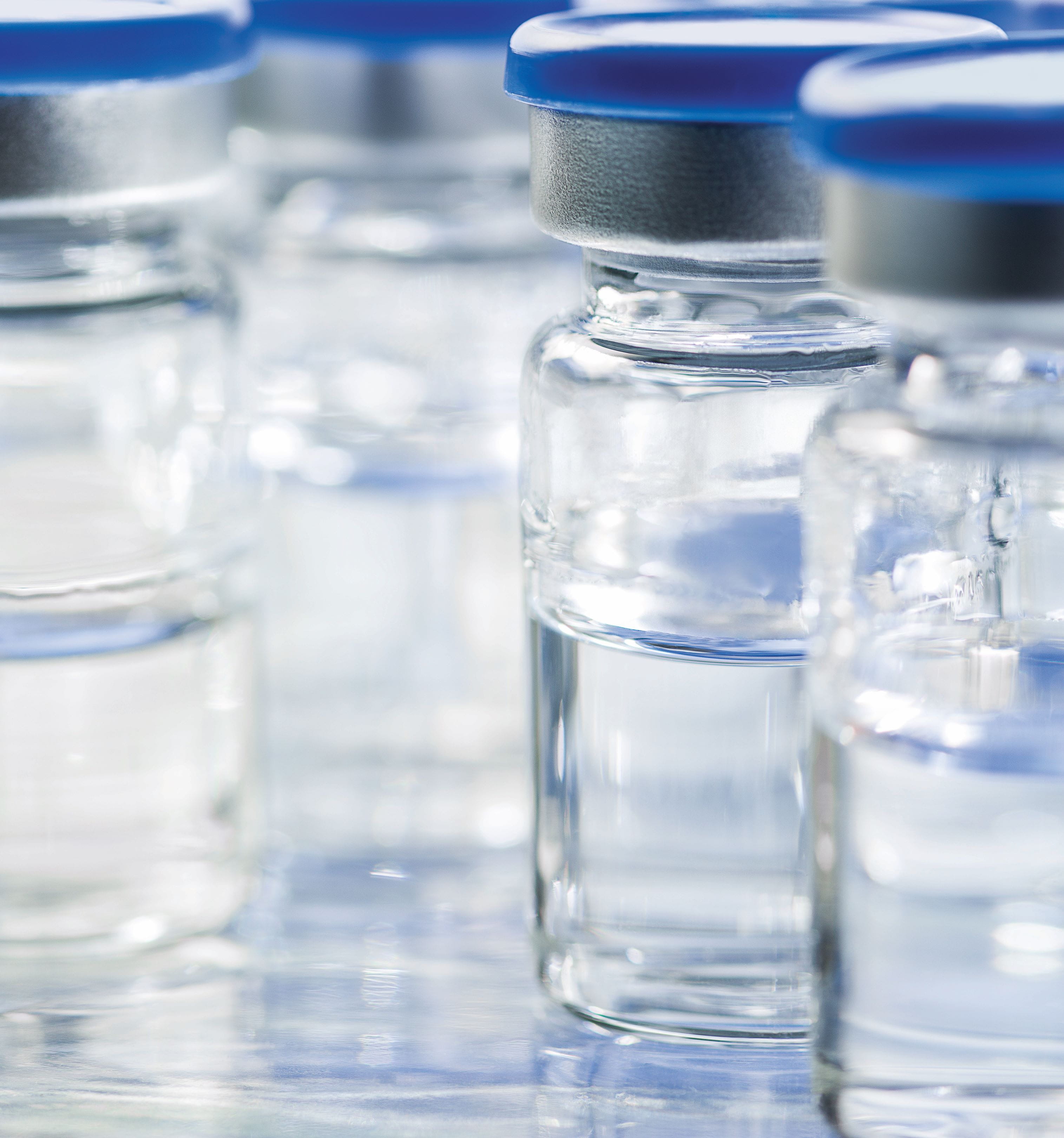 Sealed glass vials containing injectable drug solution.