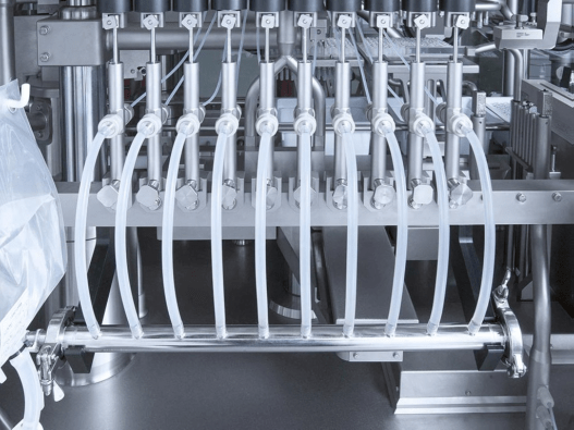 Aseptic fill-finish equipment with multiple fluid transfer lines