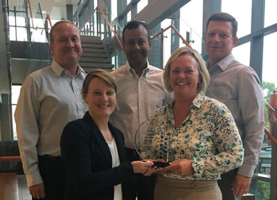 West Employees with the Supplier of the year award 