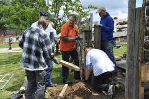 West employees in garden at community day