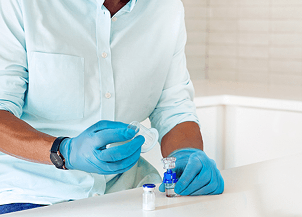 Nurse using Insert Needle Syringe